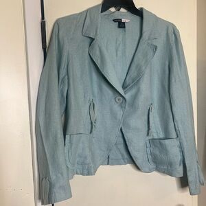 Light teal colored linen suit.
